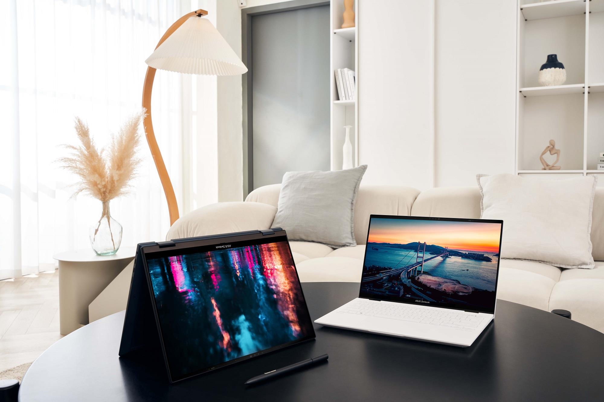 Two Zenbooks sitting on a coffee table